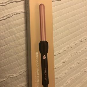 Brand new in box curling iron